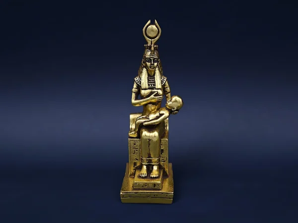 Egyptian art goddess isis breastfeeding Baby Horus made from stone and covered by gold leaf, made in egypt