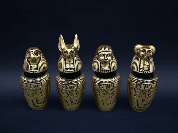 Set of four canopic jars organs Sculpture ancient Egyptian art heavy stone covered by gold leaf, made in Egypt - Image 6