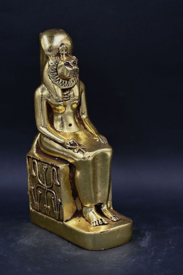 statue Goddess Sekhmet seated painted, gold leaf heavy made in Egypt